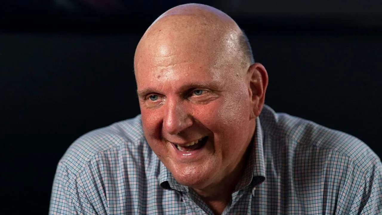 Man smiling during an interview setting Man smiling during an interview setting