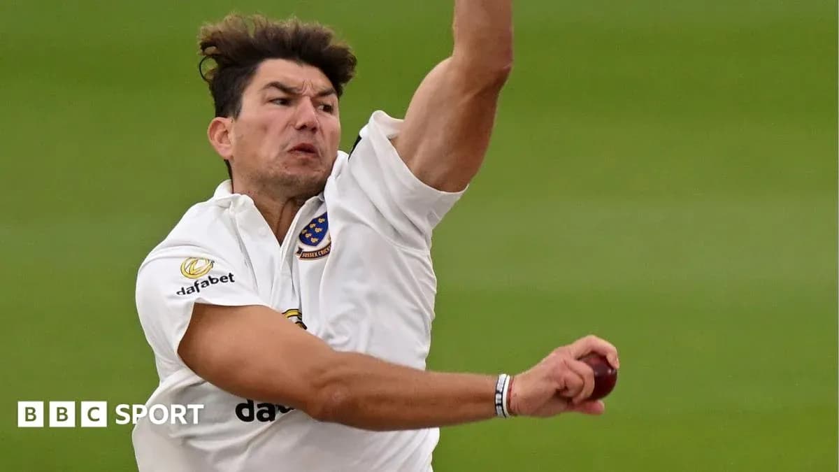 Cricketer delivering a ball during a match Cricketer delivering a ball during a match