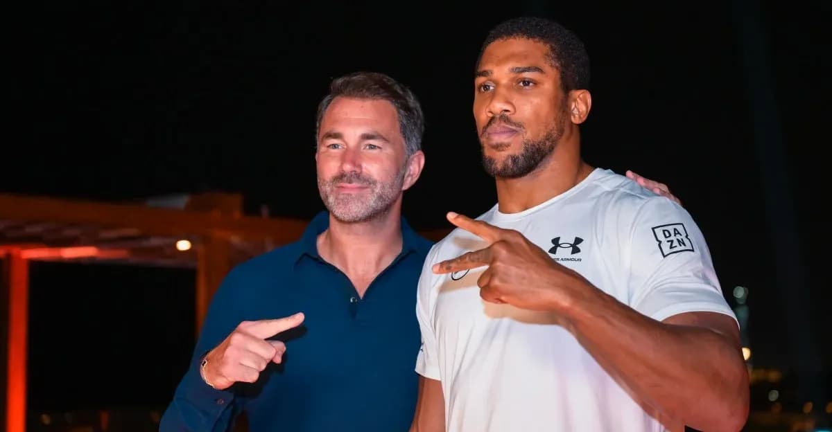Two men posing together at event venue Two men posing together at event venue