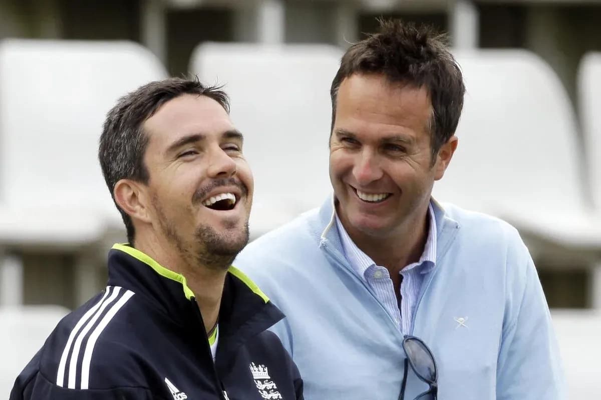 Two cricket players laughing during a casual moment Two cricket players laughing during a casual moment
