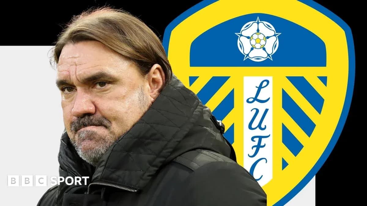 Manager with Leeds United logo in background Manager with Leeds United logo in background