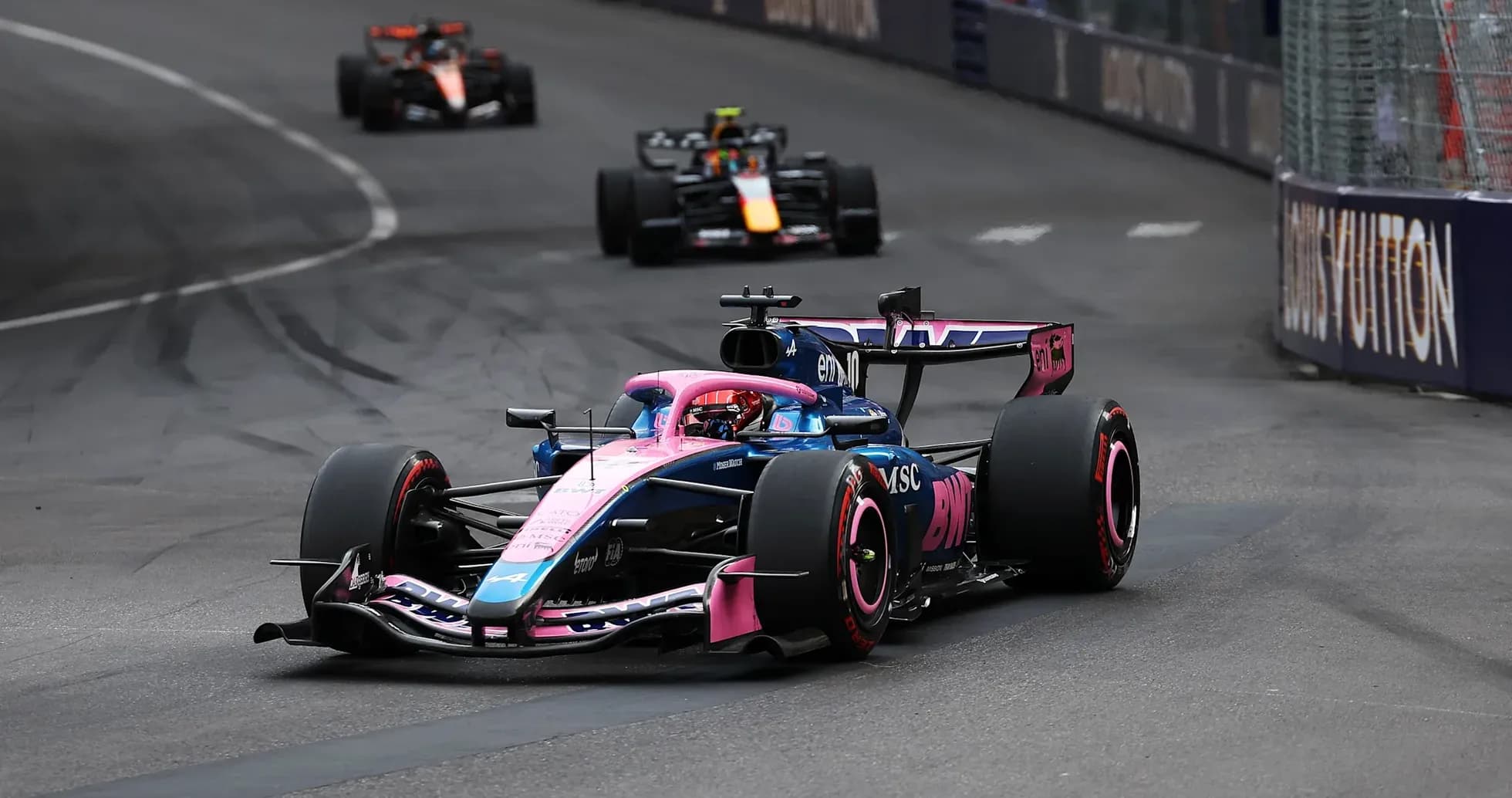 Formula 1 car racing on a street circuit Formula 1 car racing on a street circuit