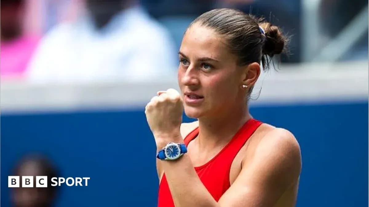 Tennis player celebrating during match at US Open Tennis player celebrating during match at US Open