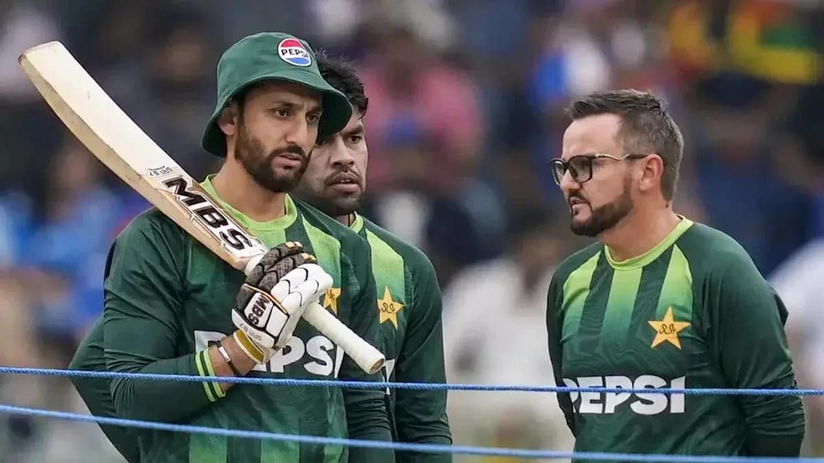Cricket players discussing strategy before match Cricket players discussing strategy before match