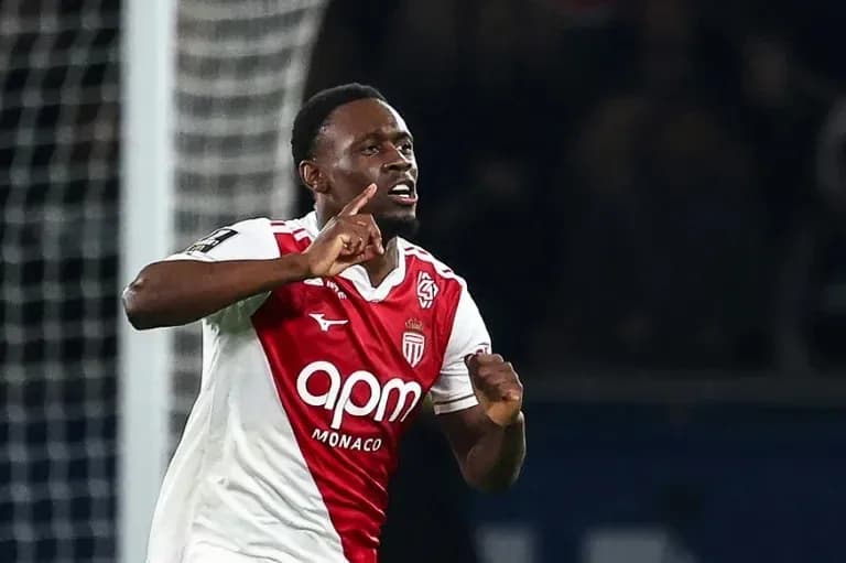 Monaco player celebrating a goal on the pitch Monaco player celebrating a goal on the pitch