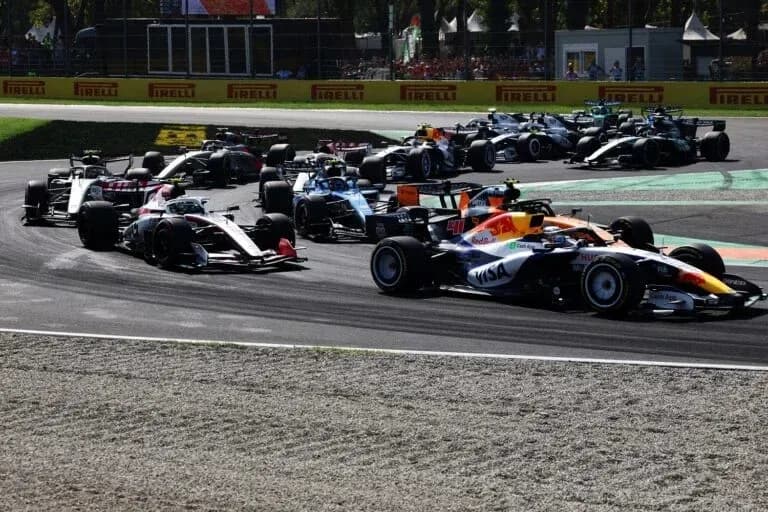F1 cars racing on track during a Grand Prix F1 cars racing on track during a Grand Prix