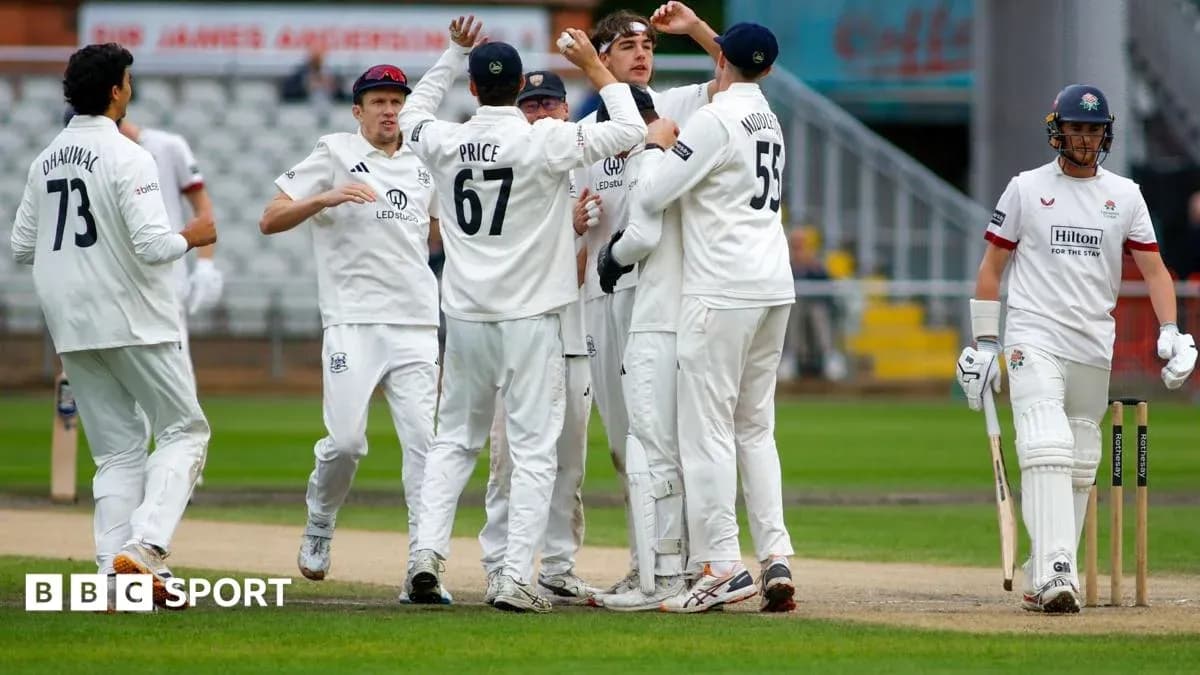 Players celebrating a wicket during cricket match Players celebrating a wicket during cricket match