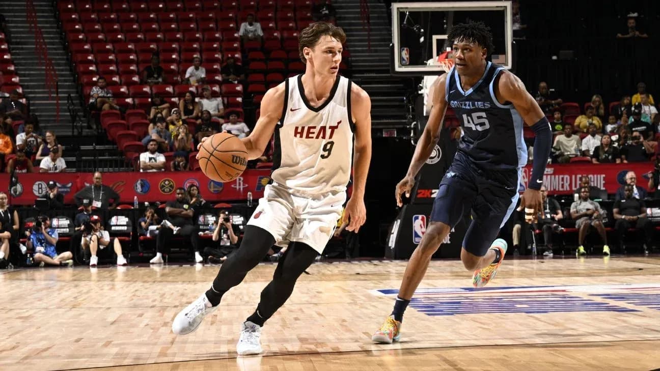 Player dribbling basketball during Summer League game Player dribbling basketball during Summer League game