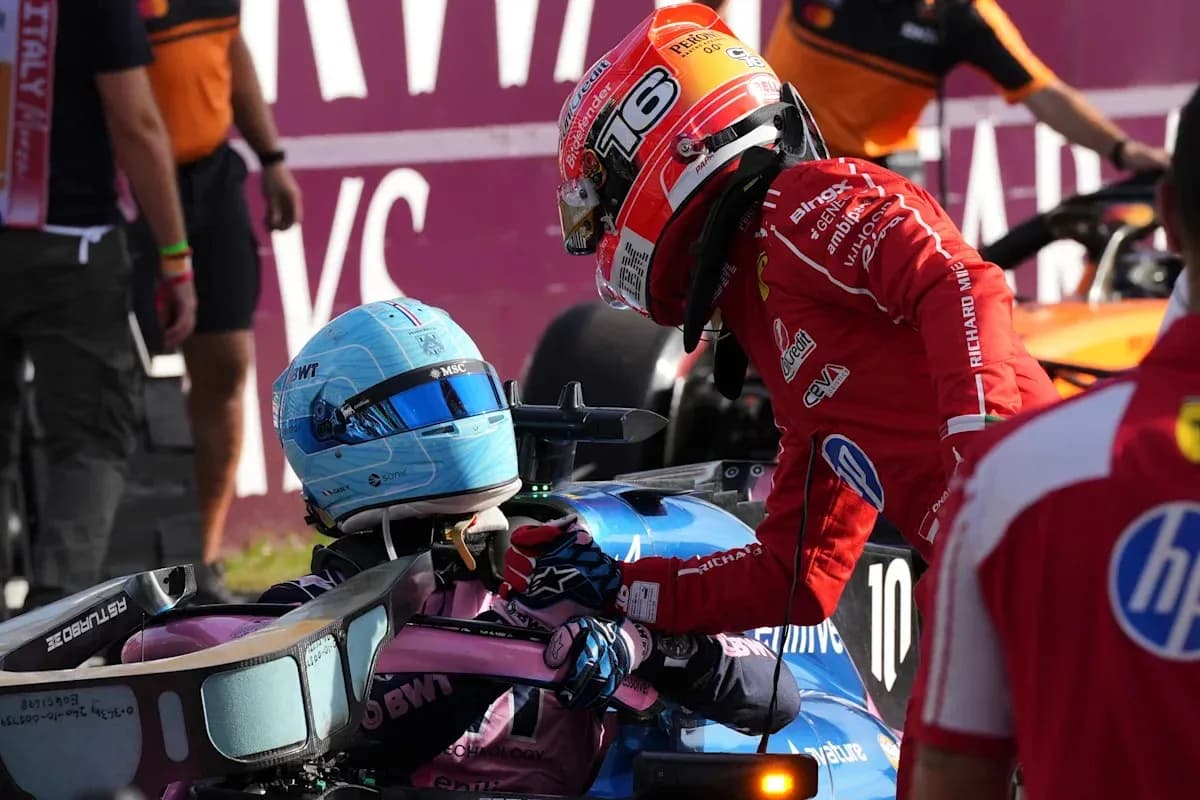 Drivers interacting after a race incident in paddock Drivers interacting after a race incident in paddock