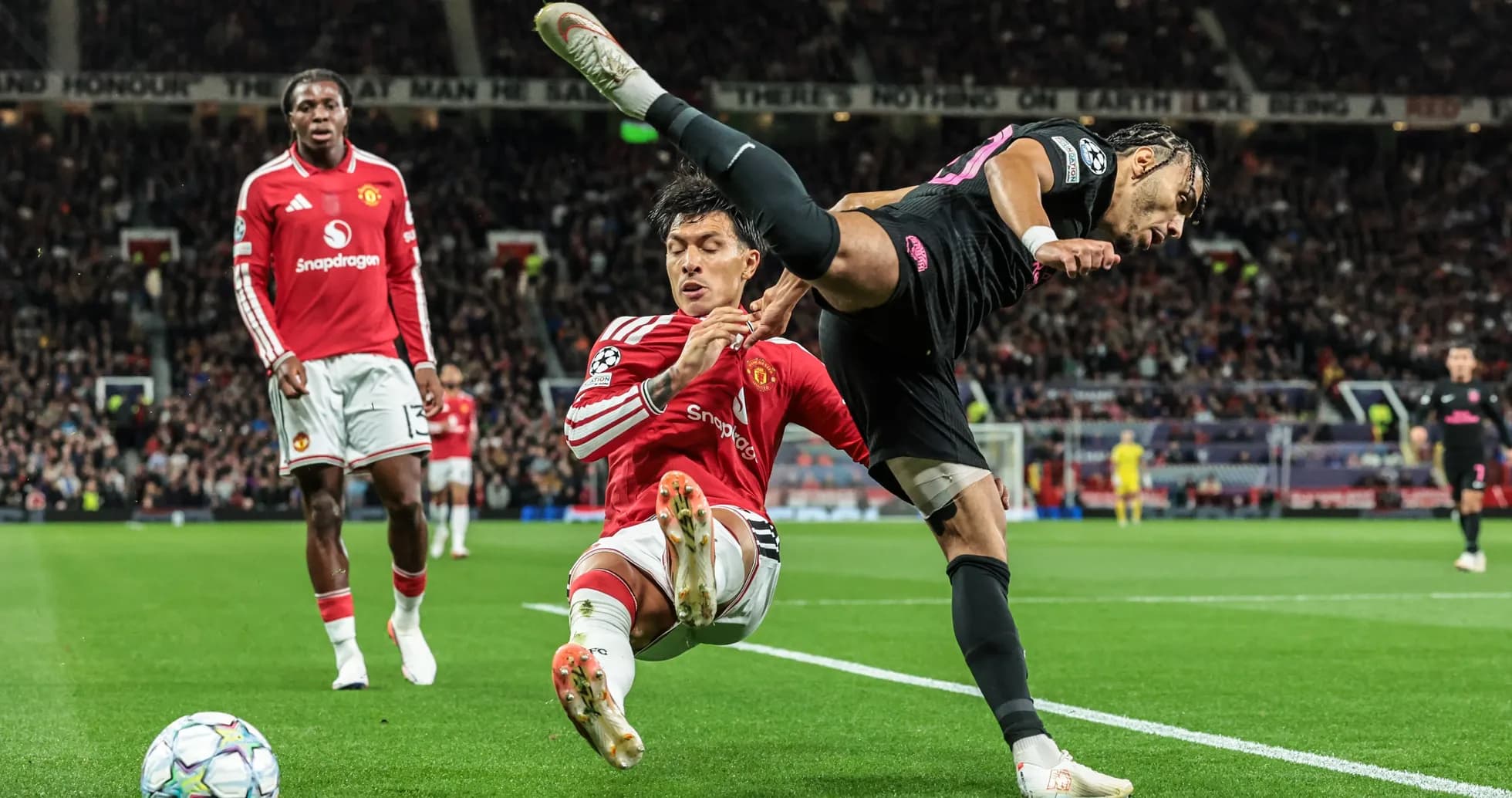 Player tackling opponent near sideline during match Player tackling opponent near sideline during match