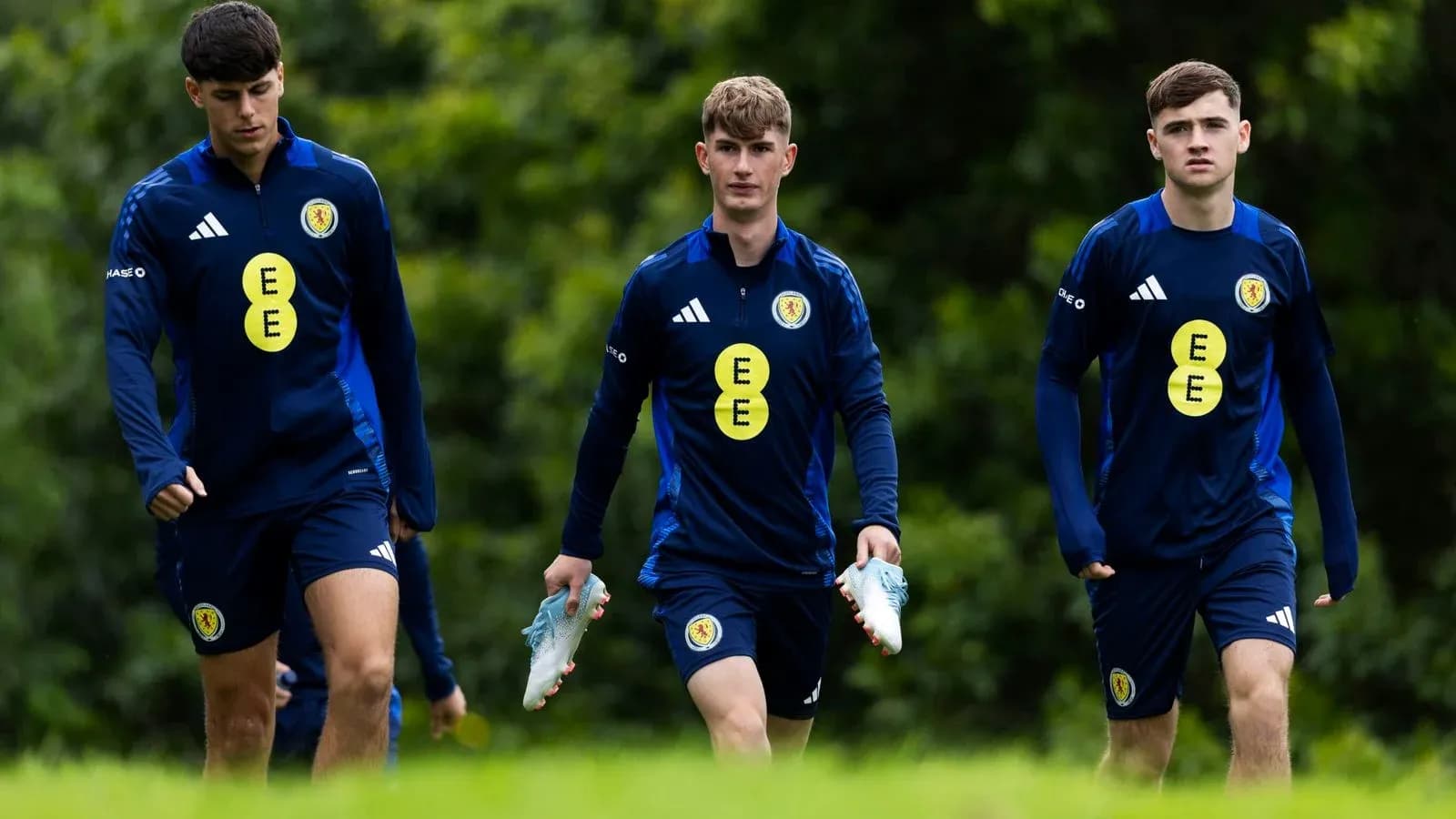 Three Scottish players walking during training session Three Scottish players walking during training session
