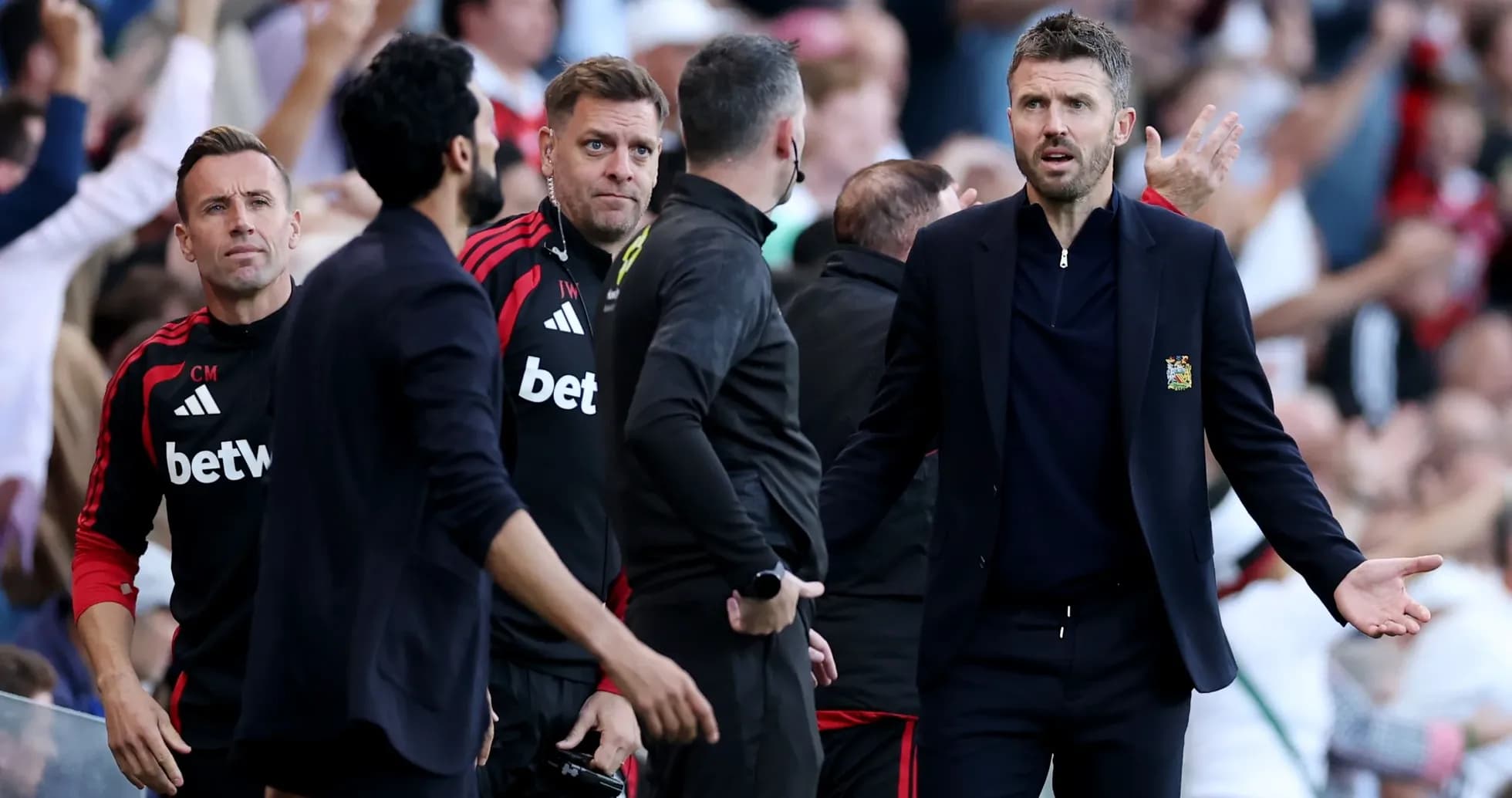 Coaching staff reacting during a tense match Coaching staff reacting during a tense match