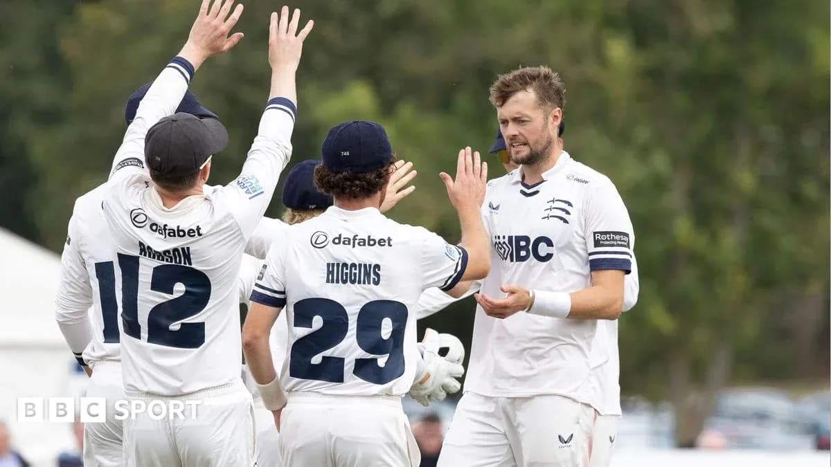Cricket team celebrating a wicket during match Cricket team celebrating a wicket during match