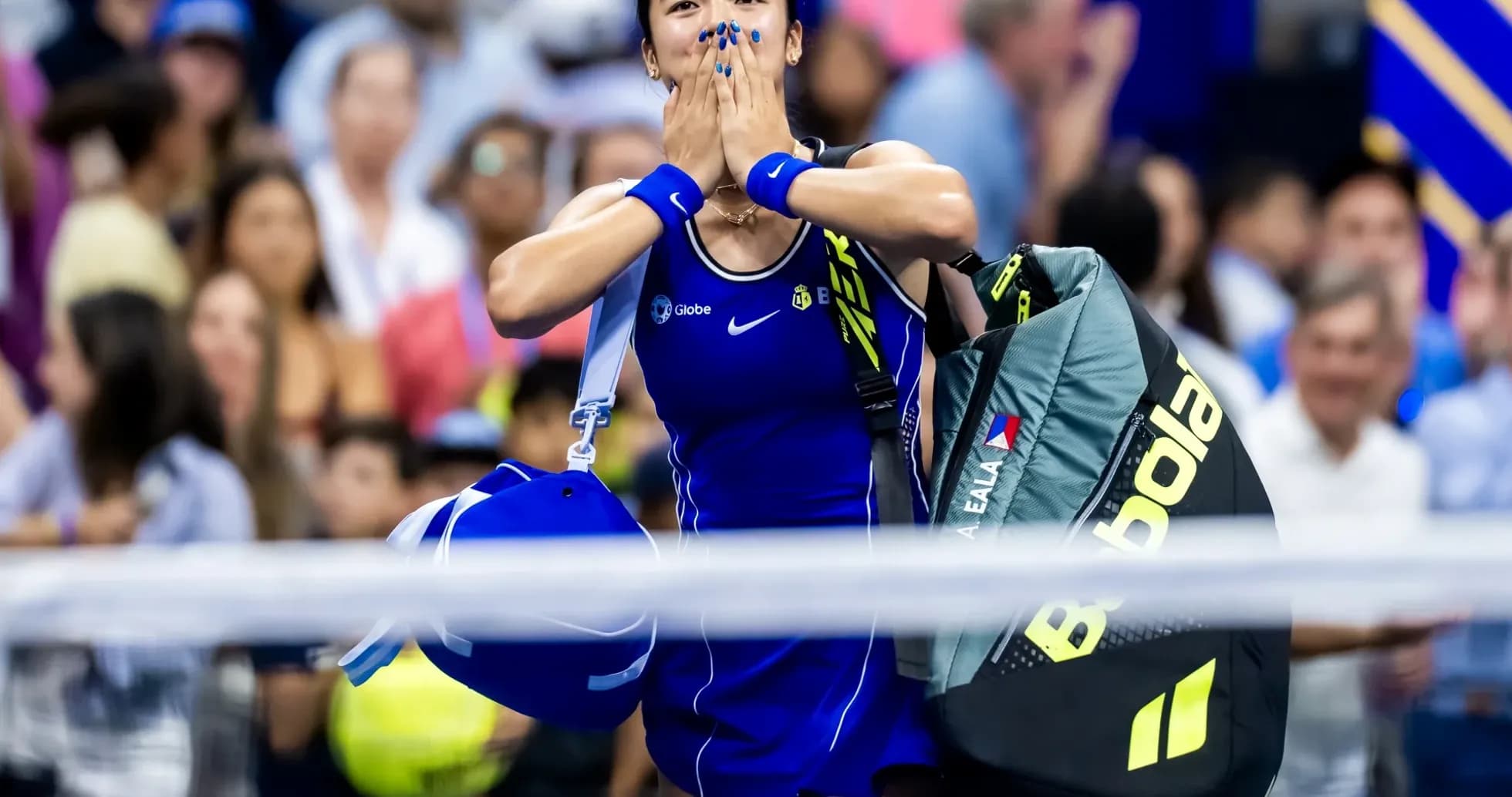 Tennis player celebrating while leaving the court Tennis player celebrating while leaving the court