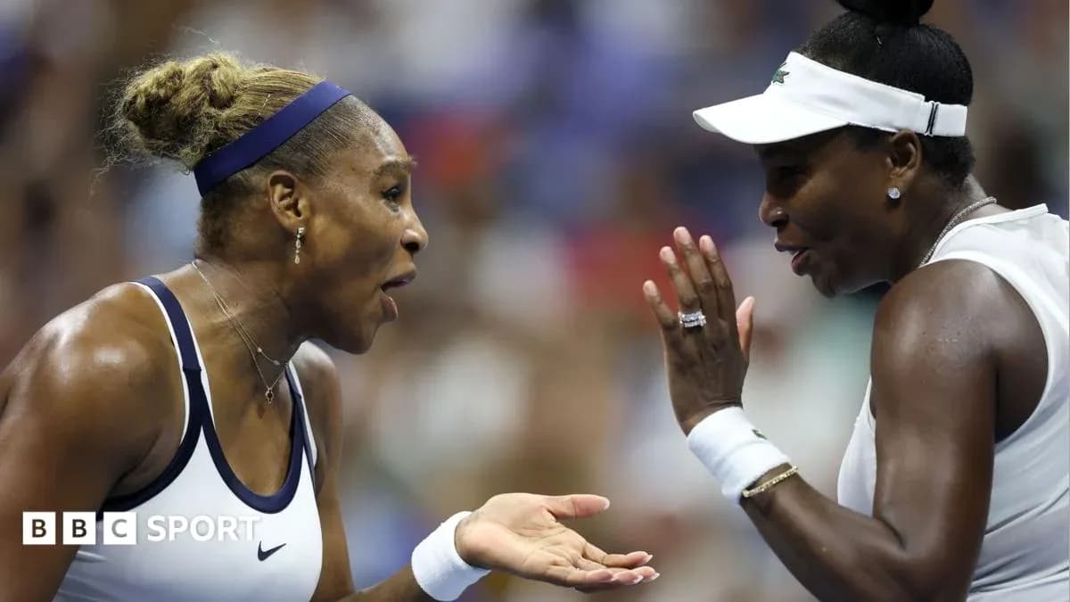 Venus and Serena Williams communicating during match Venus and Serena Williams communicating during match