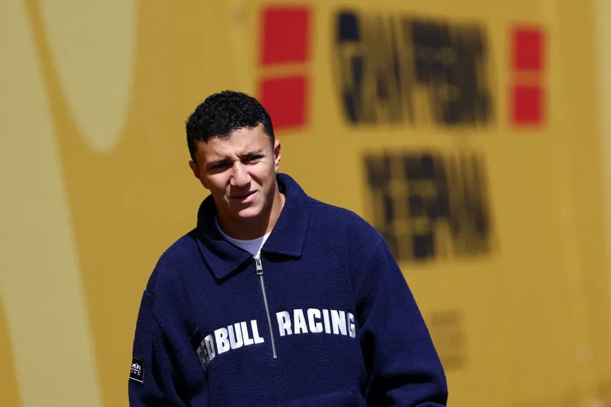 Young man in Red Bull Racing jacket outdoors Young man in Red Bull Racing jacket outdoors