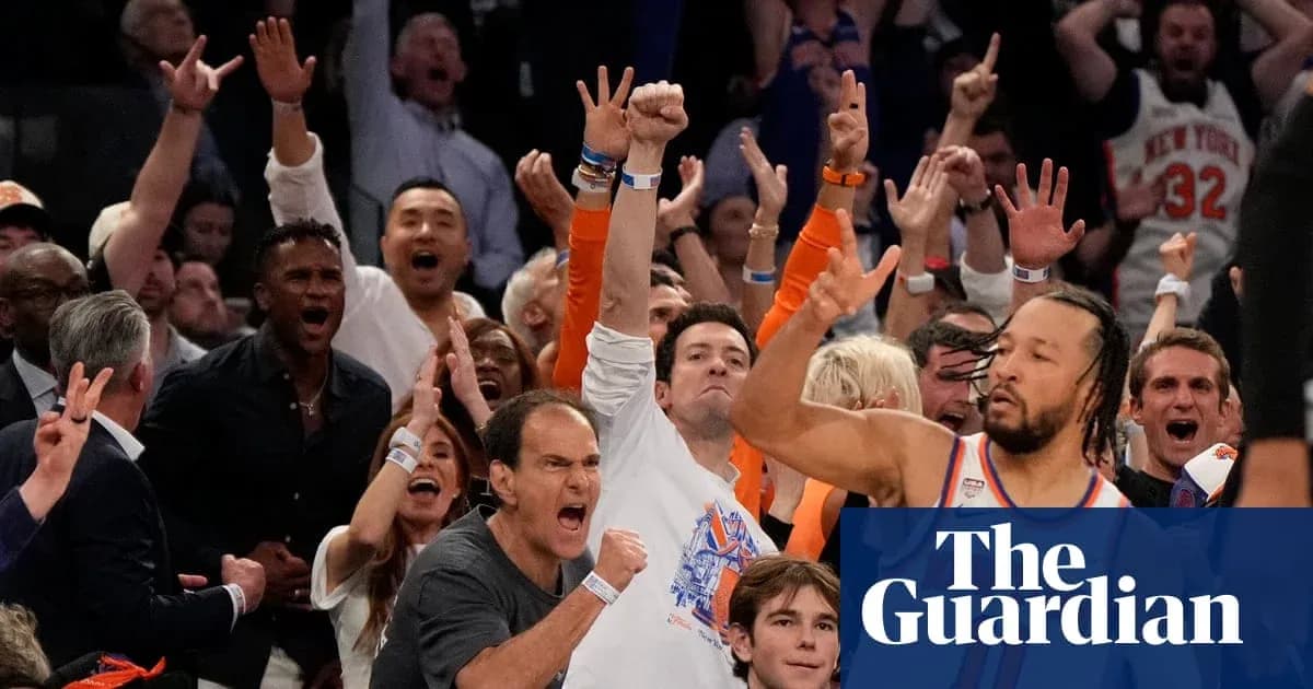 Excited crowd cheering at basketball game Excited crowd cheering at basketball game