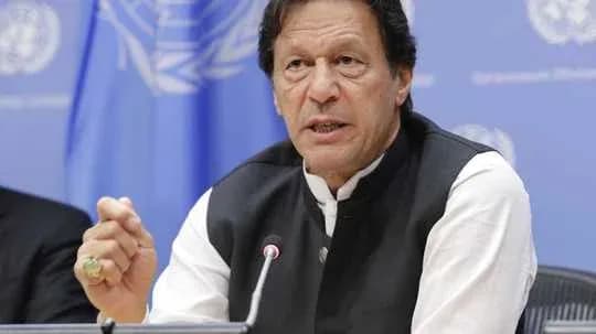 Man speaking at podium during press conference Man speaking at podium during press conference
