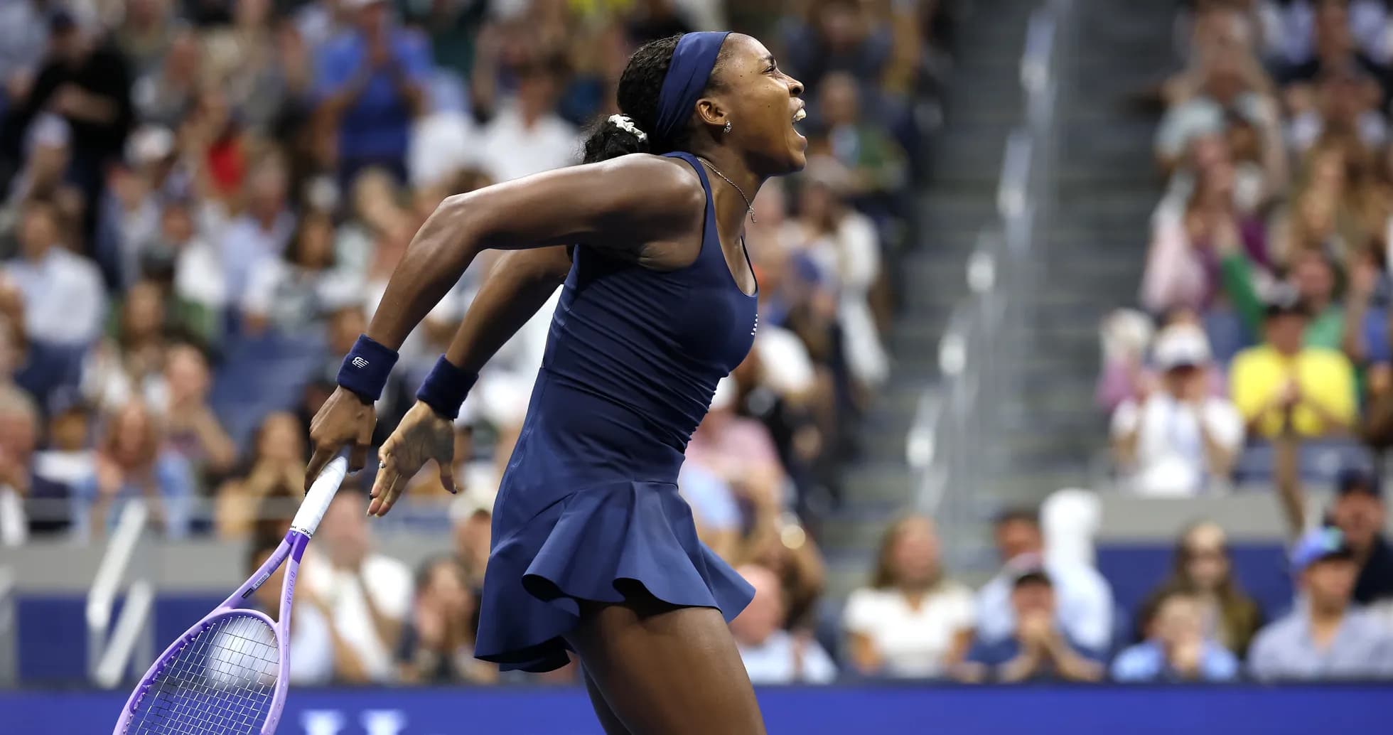 Tennis player celebrating during a match at US Open Tennis player celebrating during a match at US Open