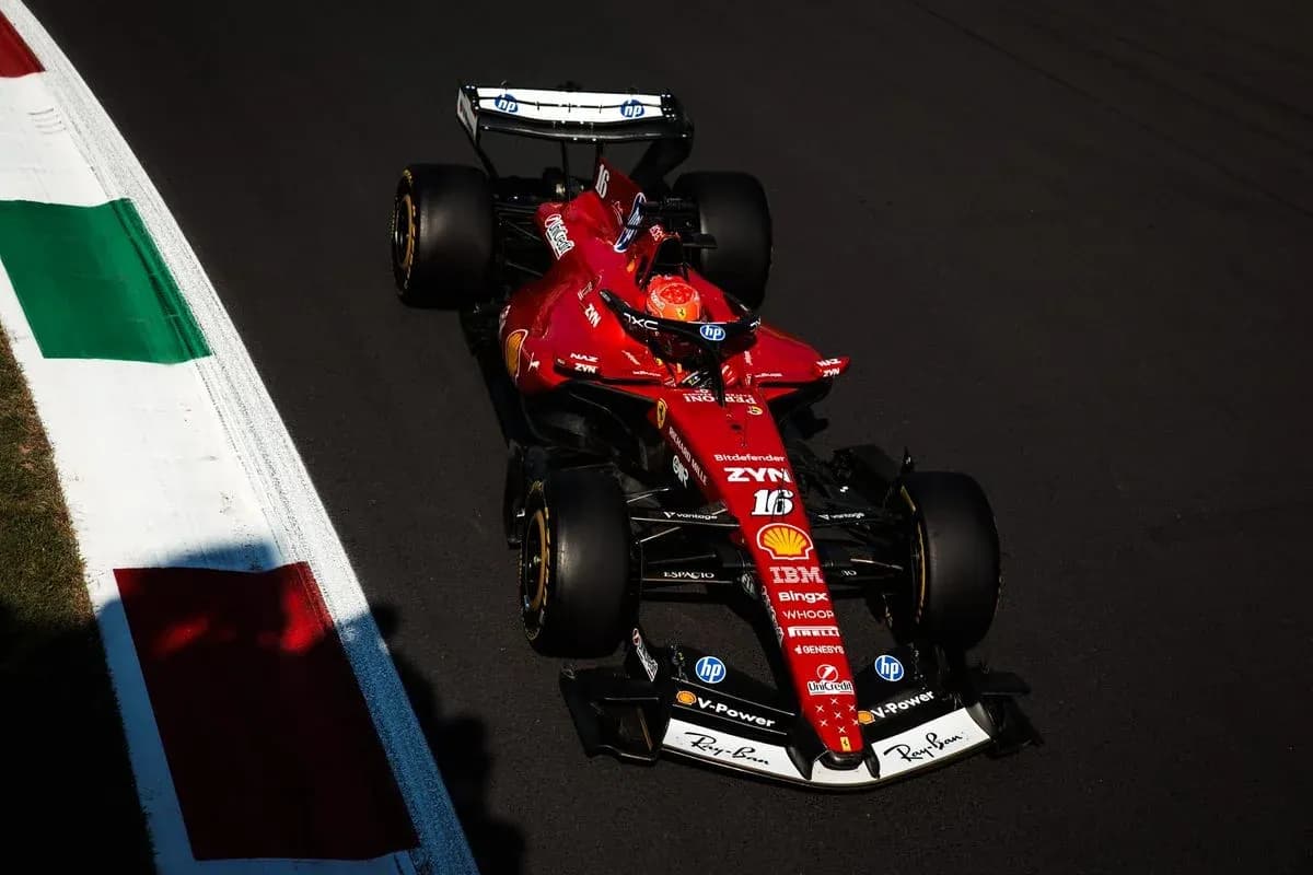 Ferrari Formula 1 car racing on track Ferrari Formula 1 car racing on track