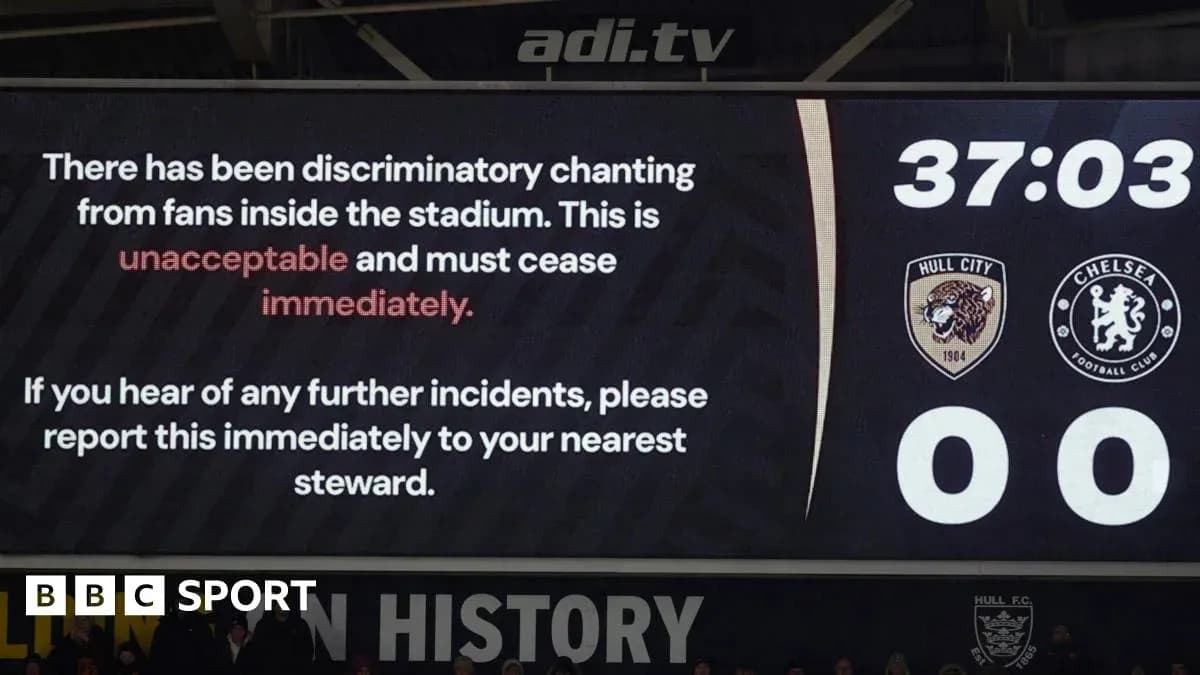Scoreboard displaying warning about discriminatory chanting Scoreboard displaying warning about discriminatory chanting