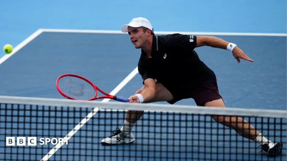 Player lunging to hit a tennis ball during match Player lunging to hit a tennis ball during match