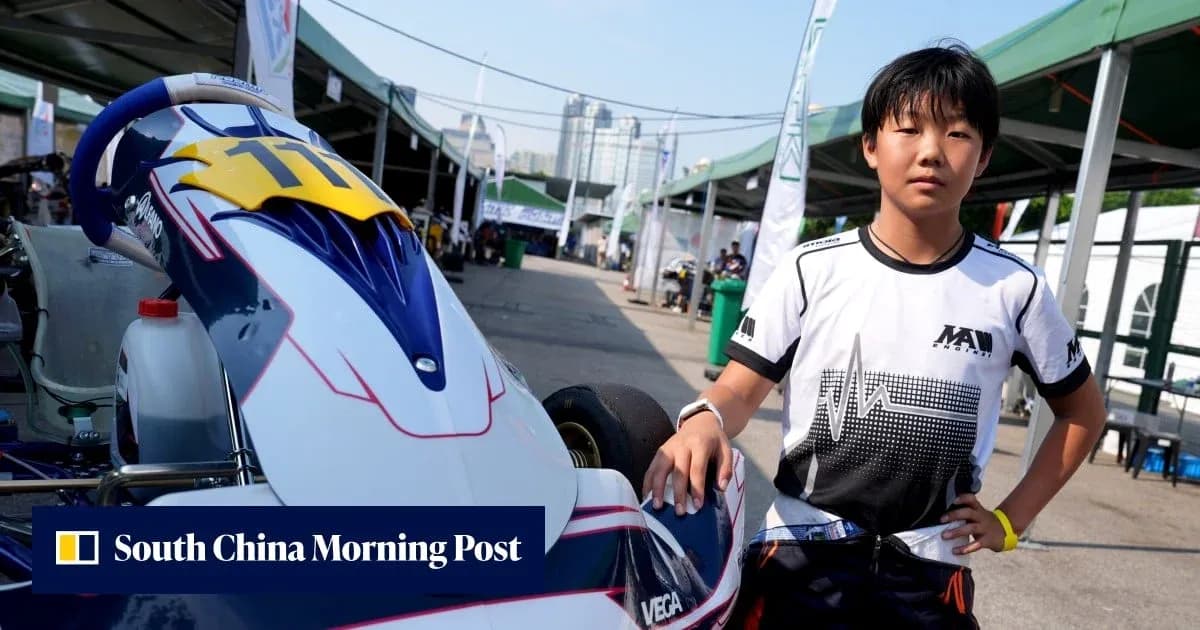 Young kart driver posing next to racing kart Young kart driver posing next to racing kart