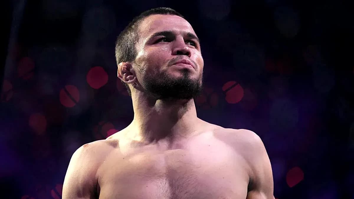 Fighter posing with focused expression before match Fighter posing with focused expression before match