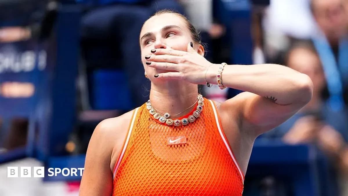 Tennis player celebrating with hand gesture after match Tennis player celebrating with hand gesture after match