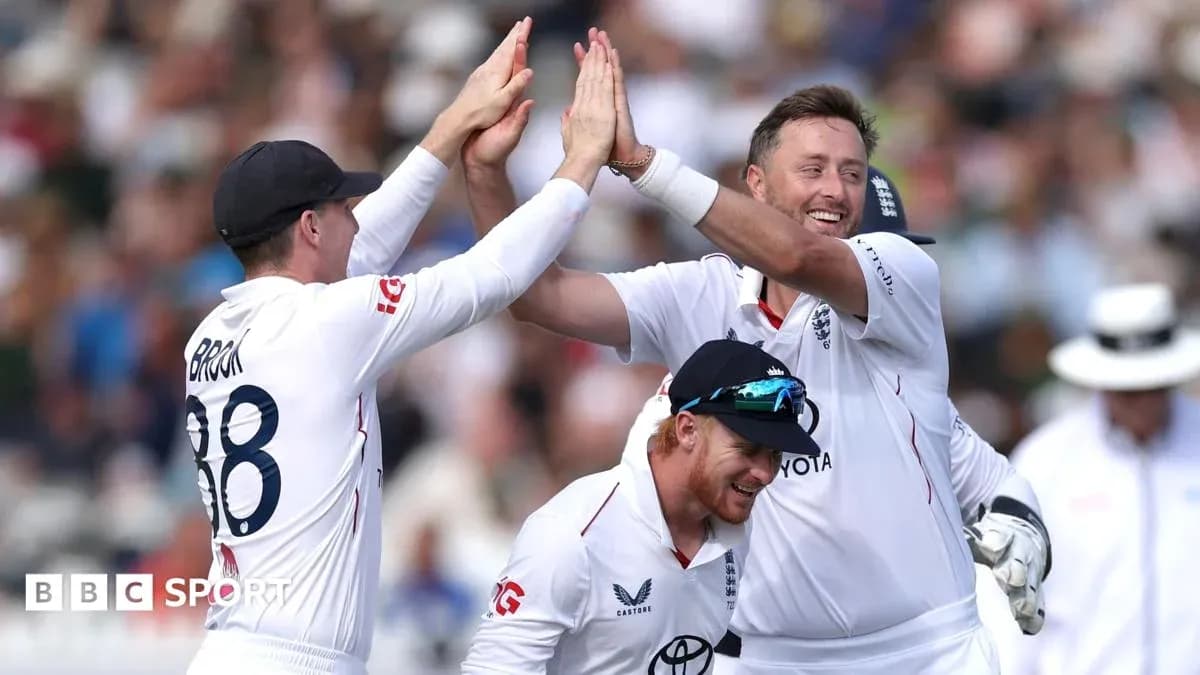 England players celebrating a wicket on the field England players celebrating a wicket on the field