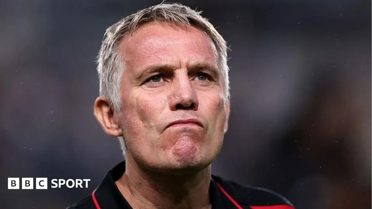 Manager looking thoughtful during a match Manager looking thoughtful during a match