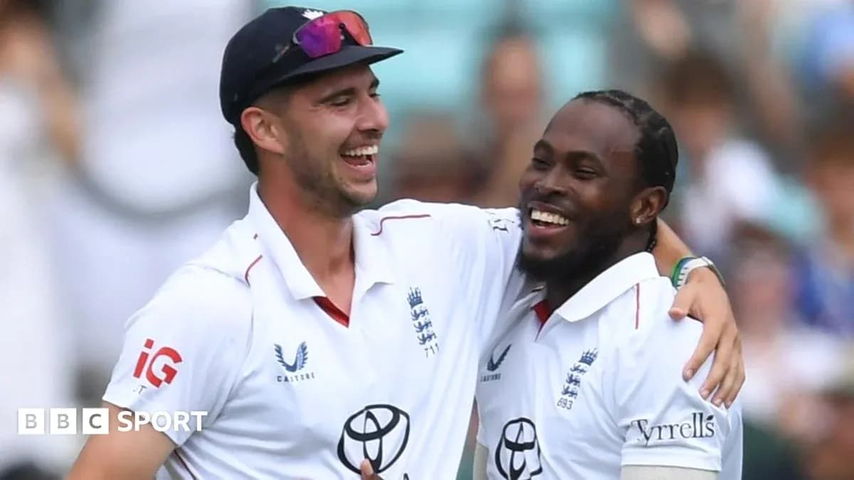 Two cricket players celebrating on the field Two cricket players celebrating on the field