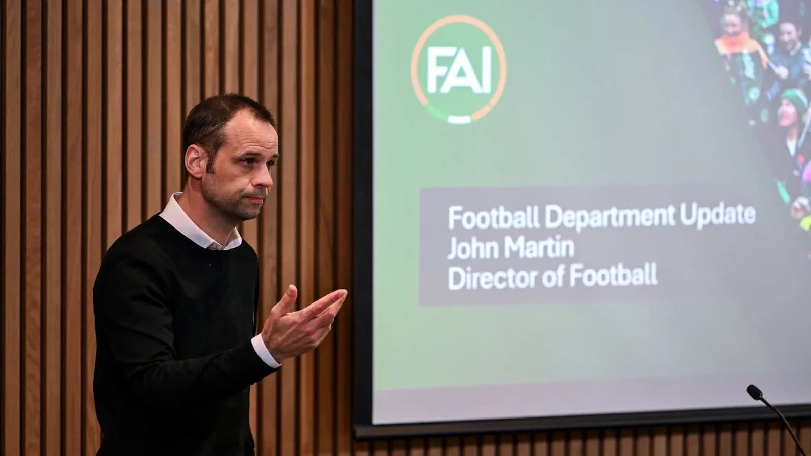 Director presenting at football department update meeting Director presenting at football department update meeting