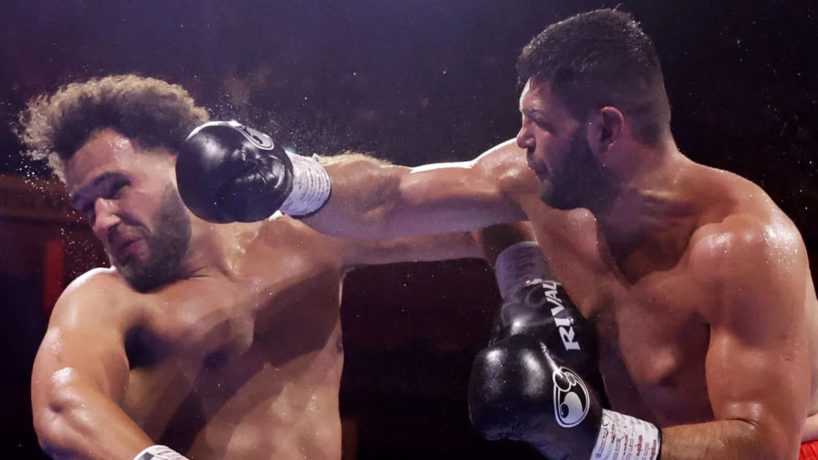Boxers exchanging punches in the ring Boxers exchanging punches in the ring