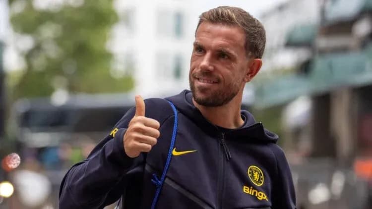 Player giving a thumbs up outside stadium Player giving a thumbs up outside stadium