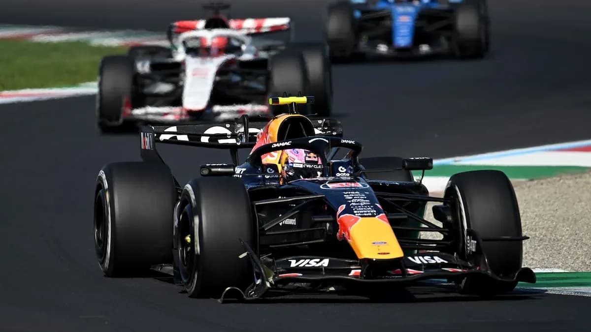 Red Bull Racing car leading in Formula 1 race Red Bull Racing car leading in Formula 1 race