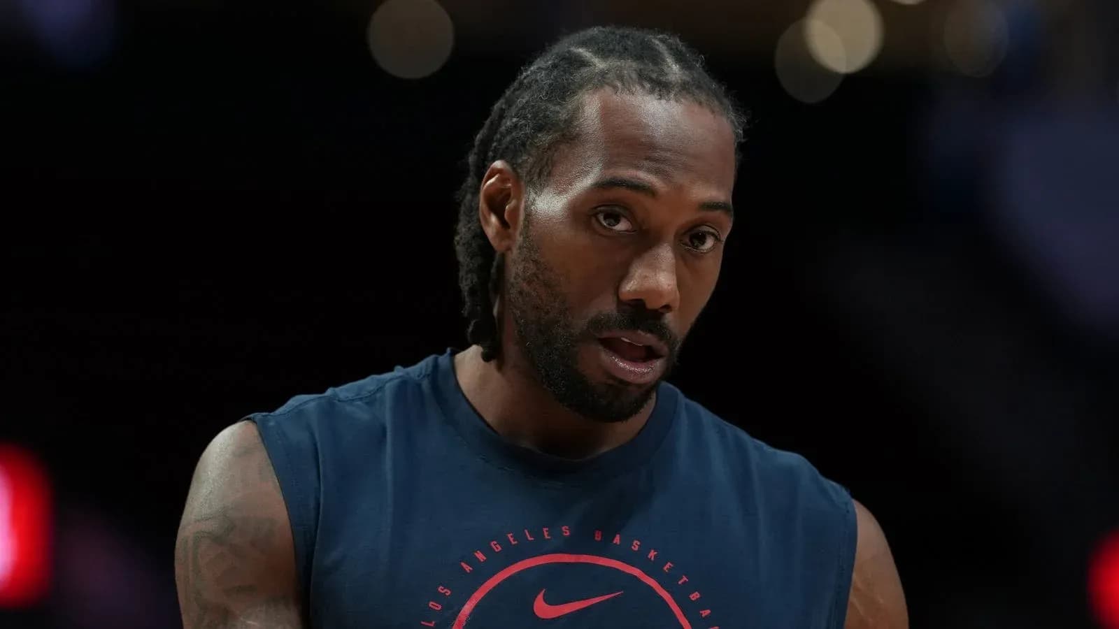 Basketball player in practice jersey during warm-up Basketball player in practice jersey during warm-up