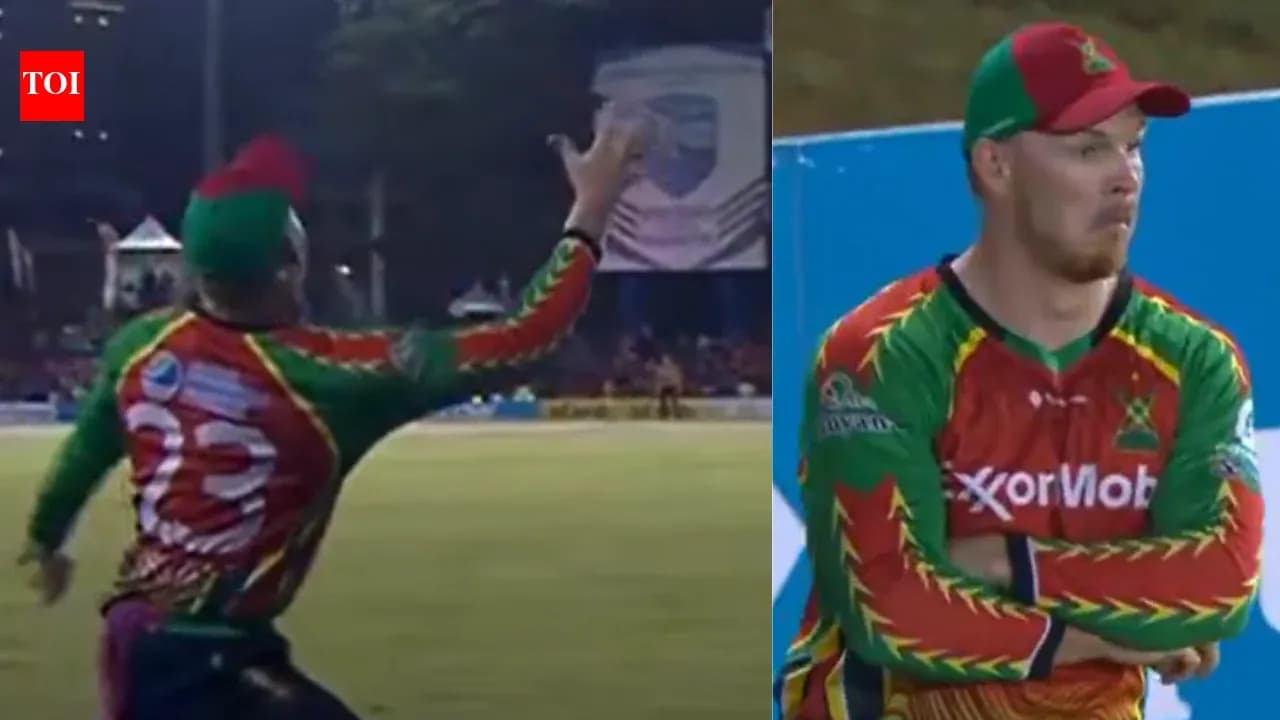 Player catching the ball during cricket match Player catching the ball during cricket match