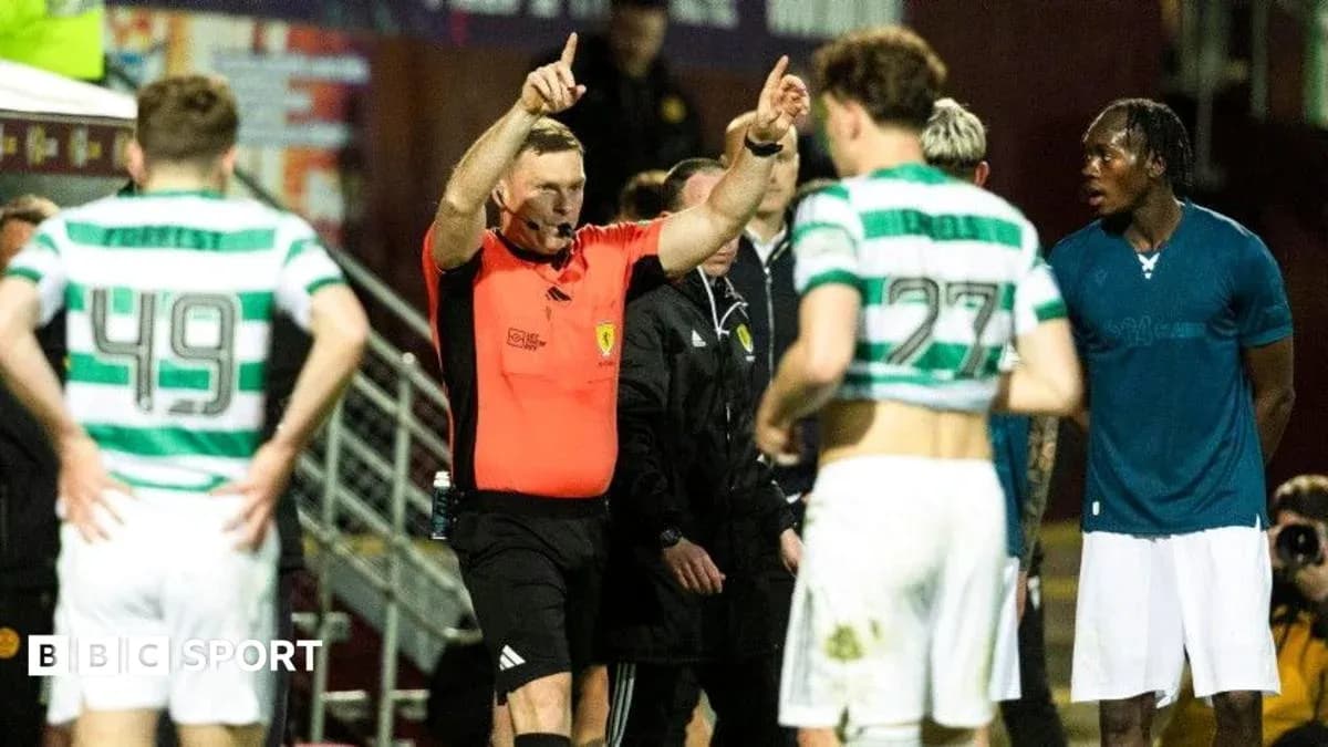 Referee issuing instructions to players on field Referee issuing instructions to players on field