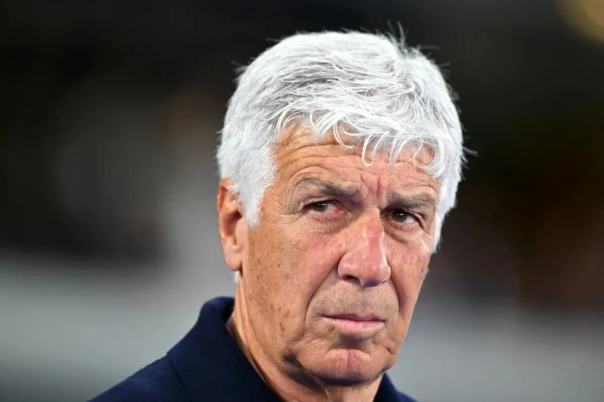 Coach with white hair looking intently at the camera Coach with white hair looking intently at the camera