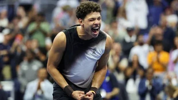 Player celebrating after winning a match Player celebrating after winning a match