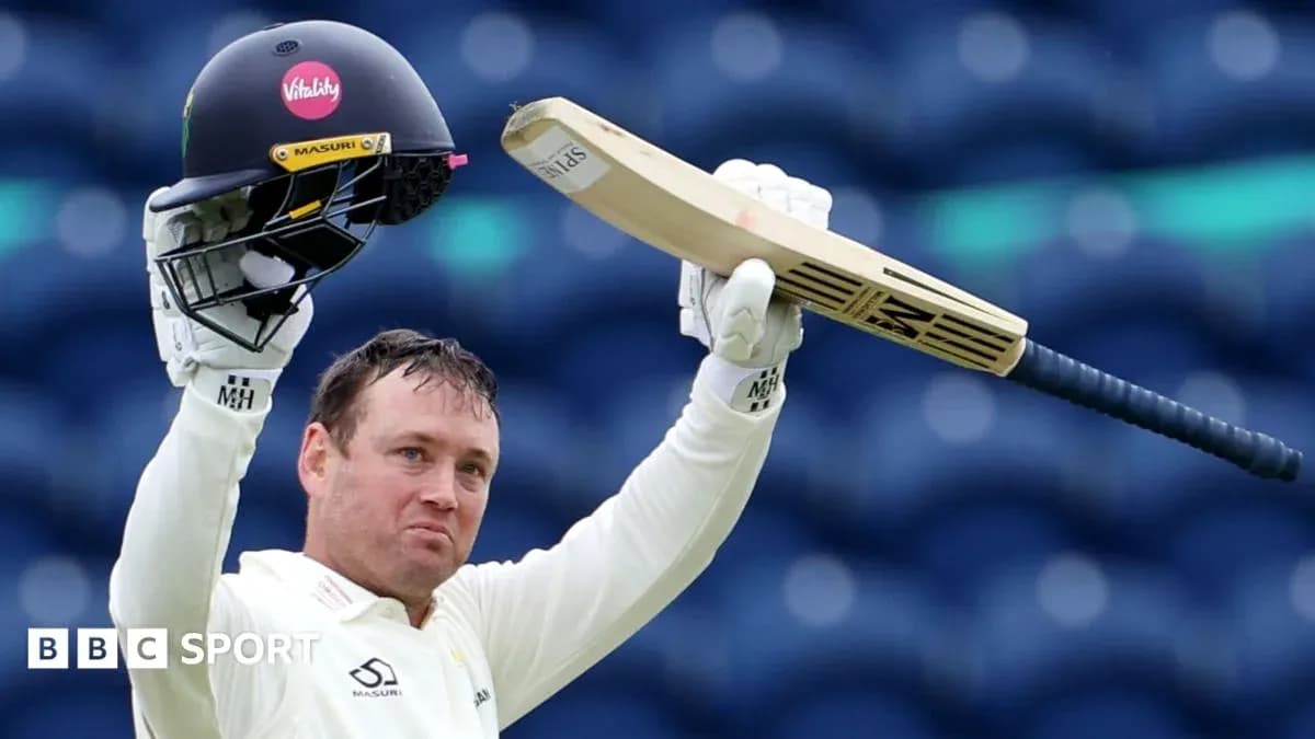 Batsman celebrating with helmet and bat raised Batsman celebrating with helmet and bat raised