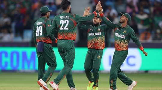 Bangladesh cricket team celebrating a wicket Bangladesh cricket team celebrating a wicket