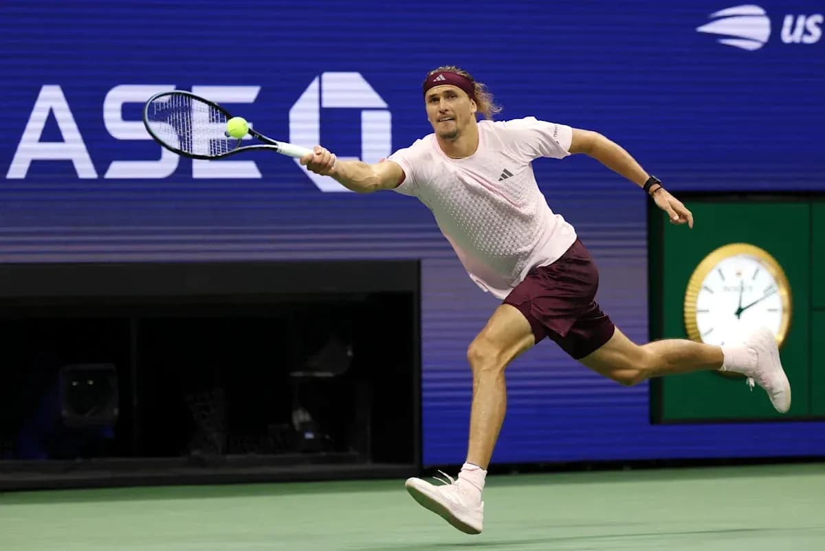 Player lunging to hit a tennis ball during match Player lunging to hit a tennis ball during match