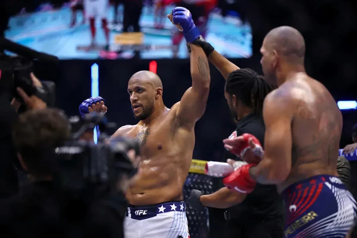 Fighter celebrating victory in UFC match Fighter celebrating victory in UFC match