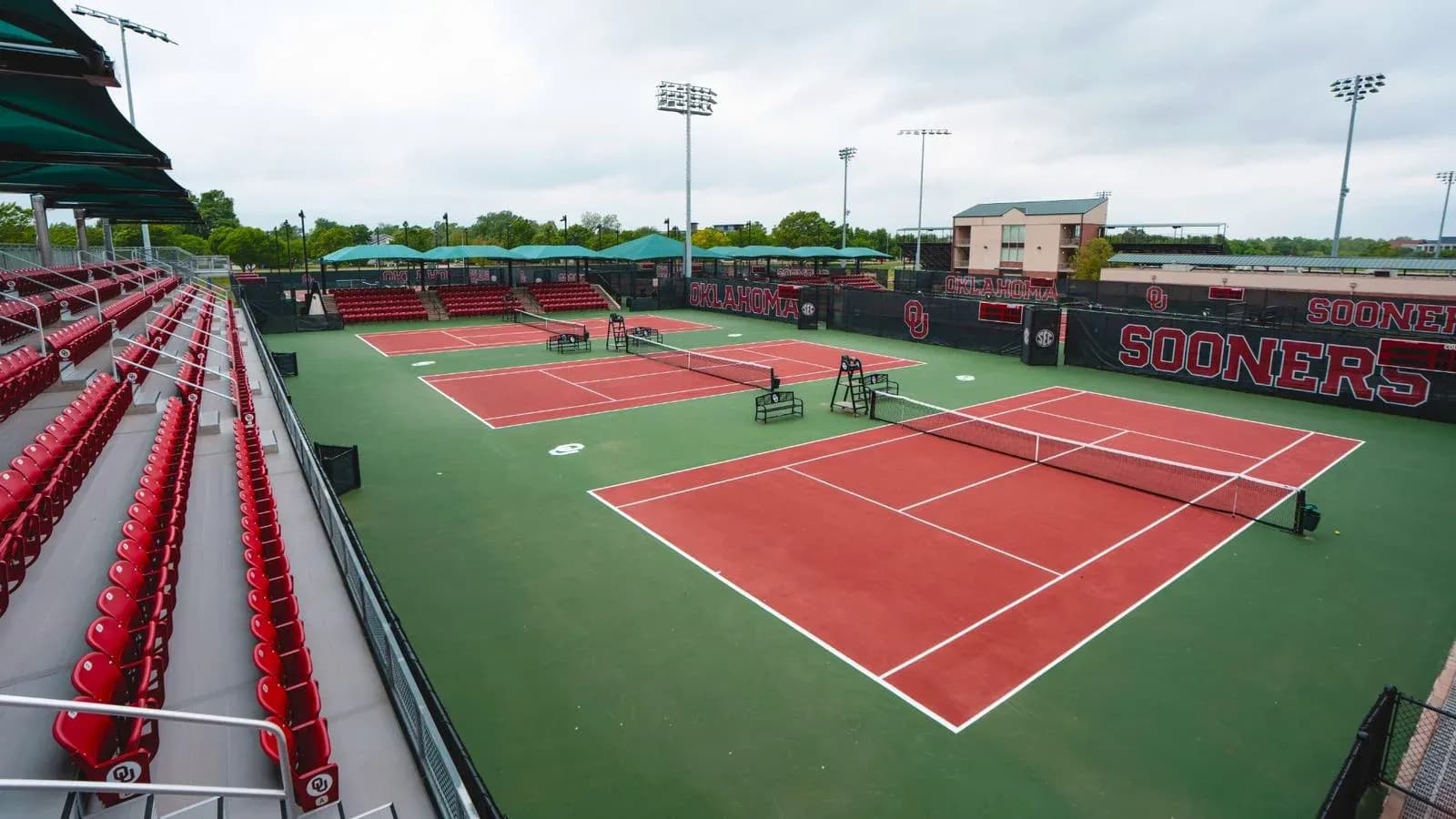 Oklahoma tennis courts with empty seating area Oklahoma tennis courts with empty seating area
