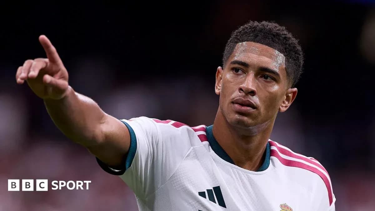 Player signaling during a football match Player signaling during a football match