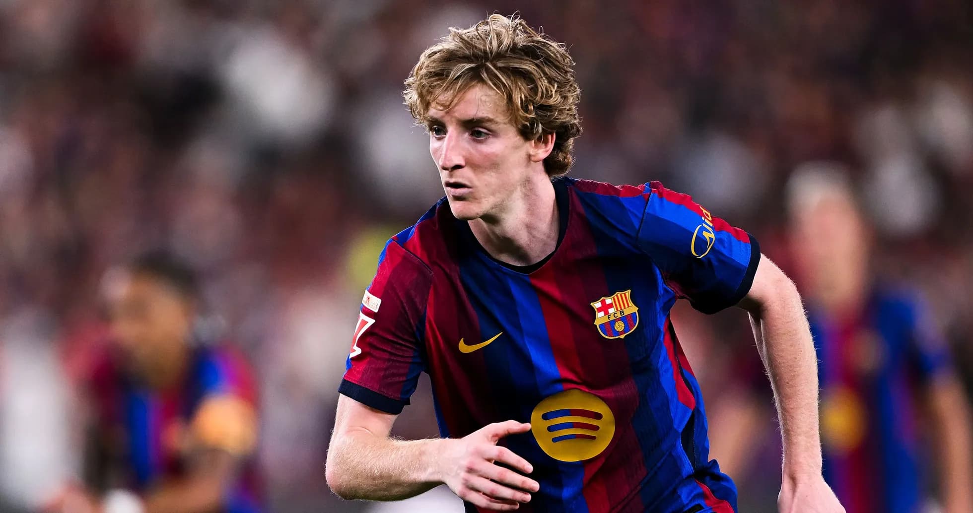 Player running during match wearing Barcelona kit Player running during match wearing Barcelona kit