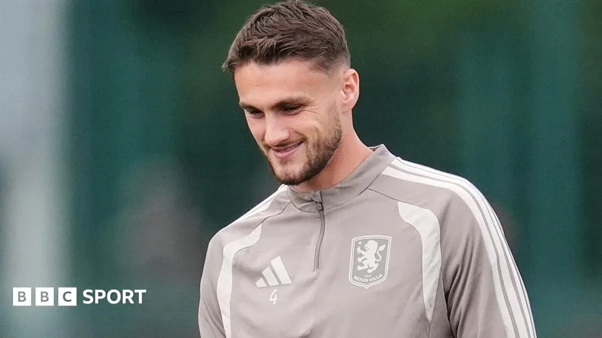 Player smiling during Aston Villa training session Player smiling during Aston Villa training session