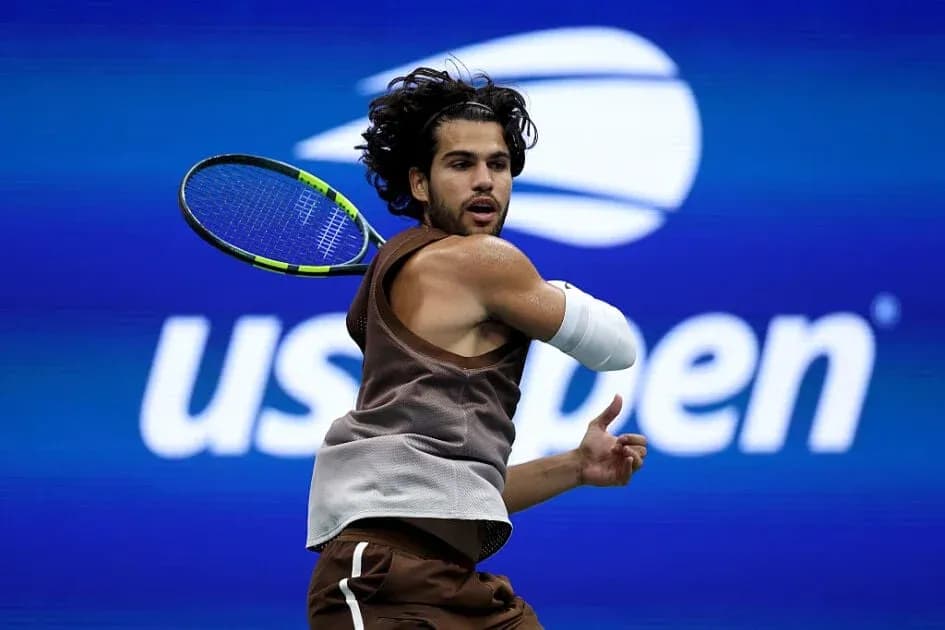 Player hitting a forehand shot at US Open Player hitting a forehand shot at US Open